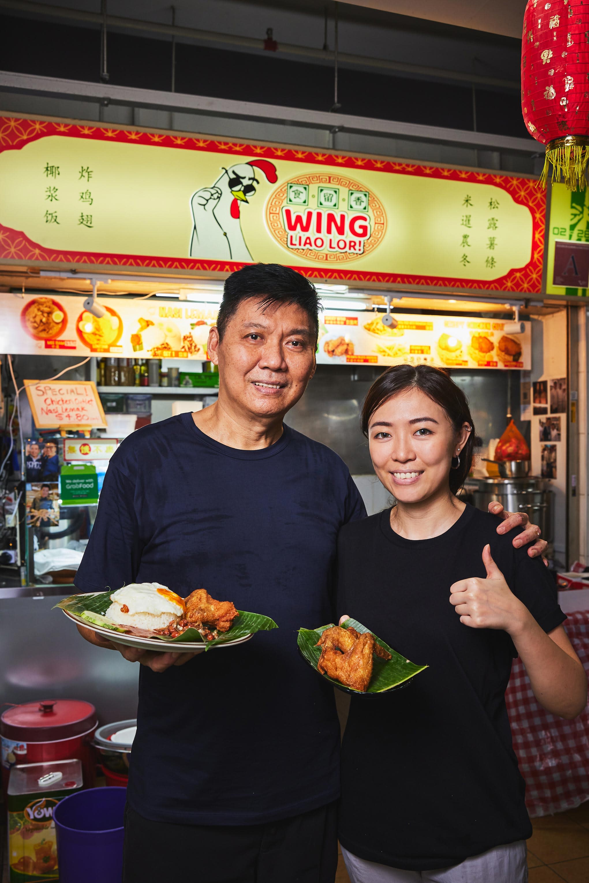 wing liao lor owners posing with dishes lv 1499 data
